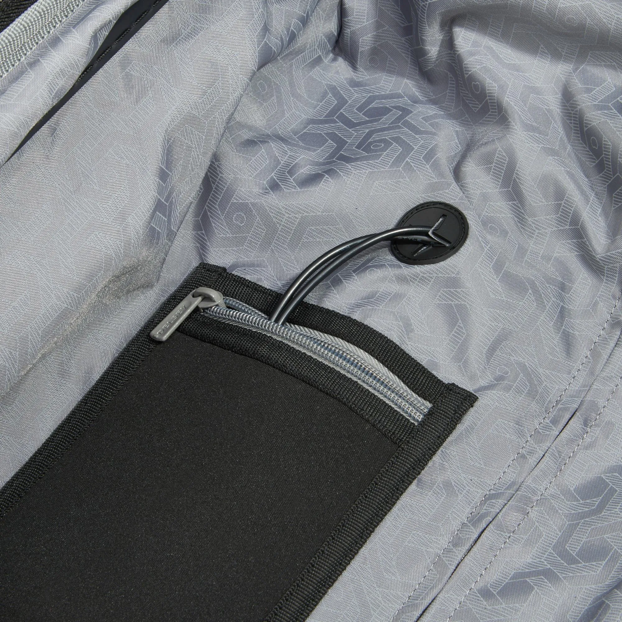 DELSEY Paris Chromium Lite 21" 4-Wheel Carry-On Luggage