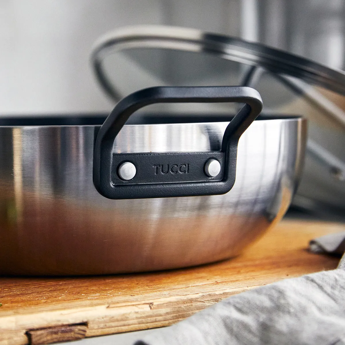 Stanley Tucci™ Stainless Steel Ceramic Nonstick 6.5-Quart Essential Stanley Pan with Lid | Black Handle